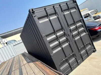20ft Used Shipping Container – Matte Black w/ 12’ Side Roll-Up Door - Image 2